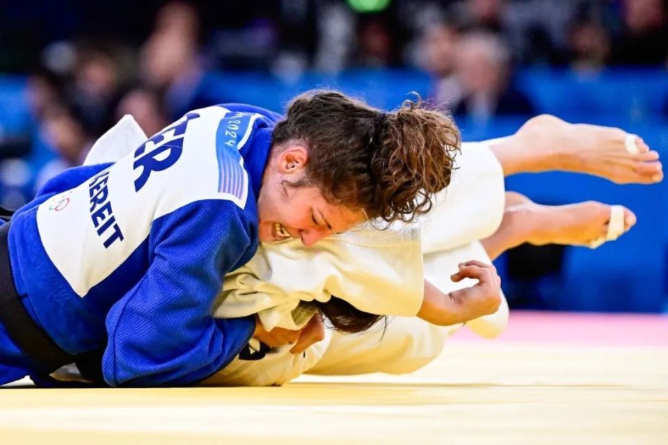 关于德国拳击选手拼尽全力，最终获得铜牌的信息