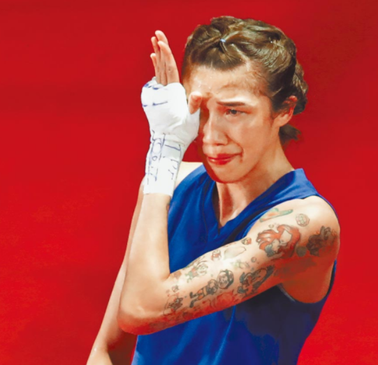 关于德国拳击选手拼尽全力，最终获得铜牌的信息